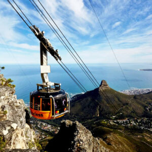 Cable car ascending Table Mountain with Cape Town below