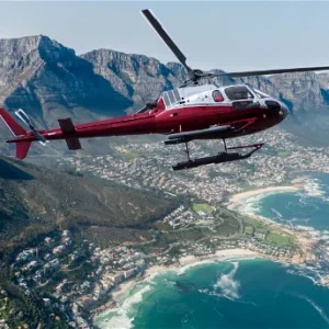 Helicopter flying over Cape Town with Table Mountain in the background