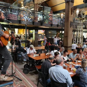 Vibrant Elgin Railway Market with food, crafts, and live music